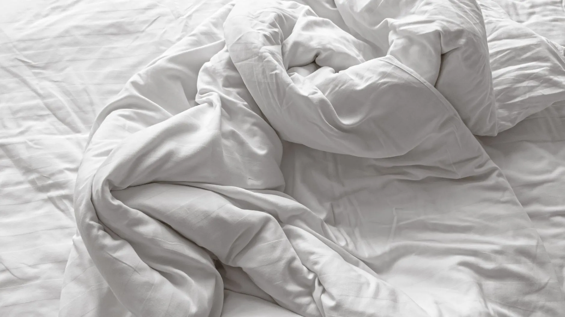 gros plan sur du linge de lit